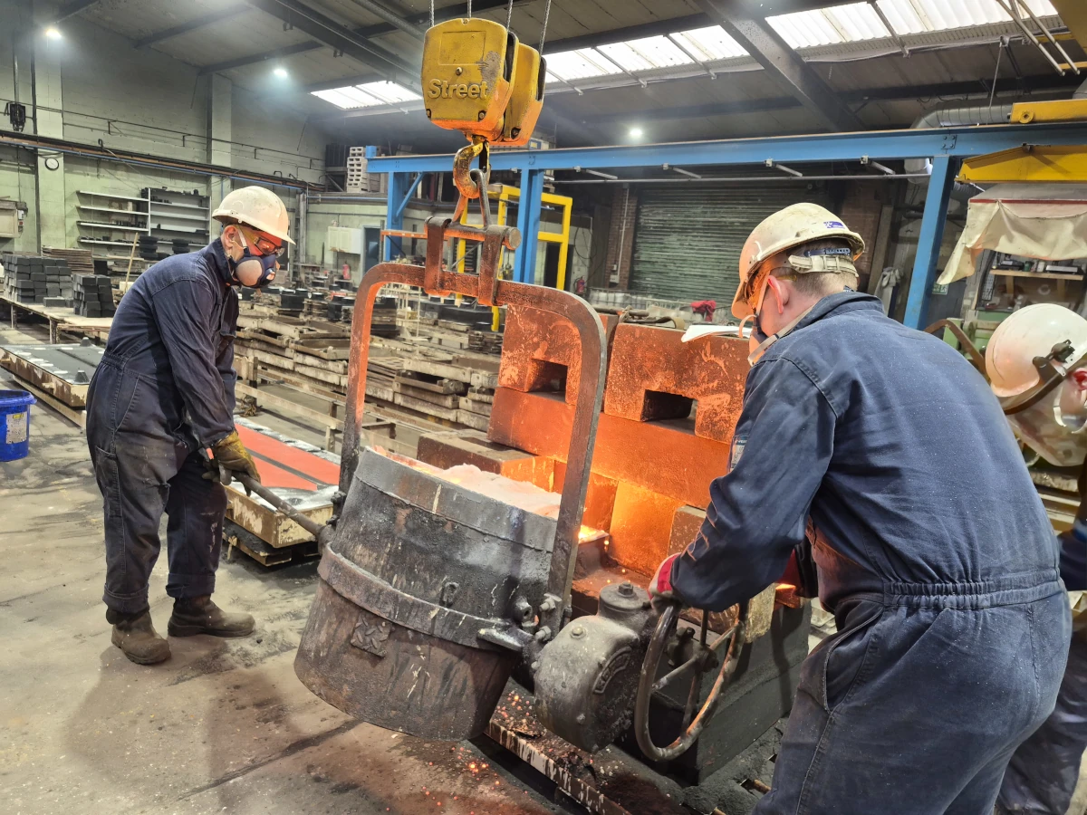 Trent Castings Ltd foundry workers pouring molten iron
